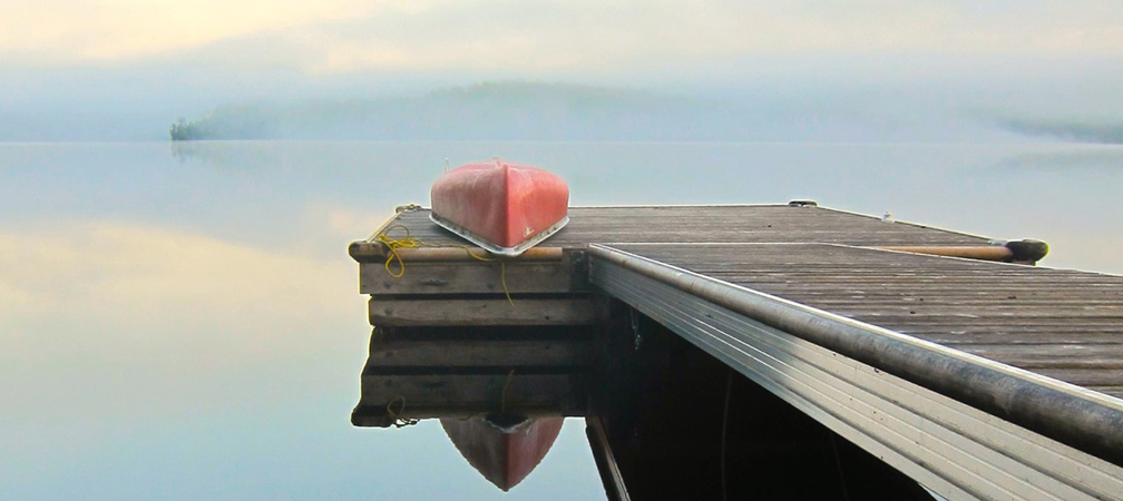 red canoe and dock
