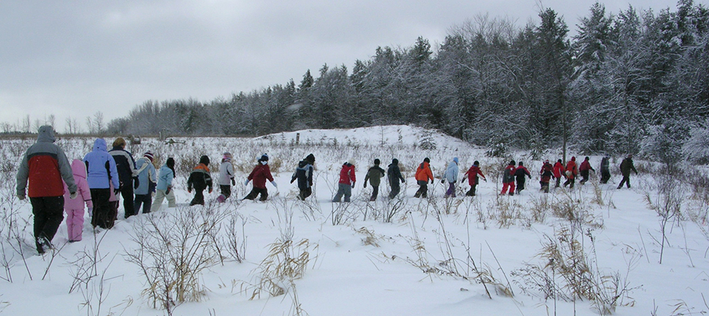 A group of children on a winter hike, Grand River Conservation Authority